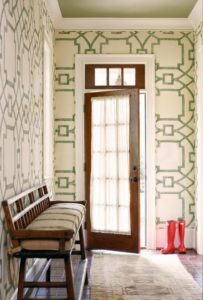 Entry hall with white and green graphic print wallpaper, French door and settee Via CocoKelley