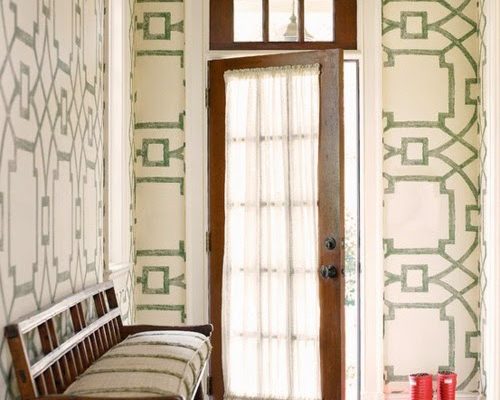 Entry hall with white and green graphic print wallpaper, French door and settee Via CocoKelley