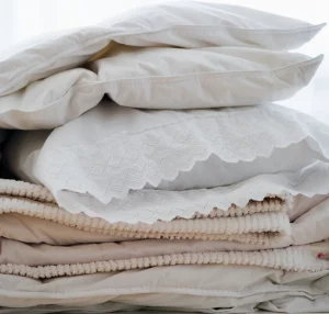 Soft blankets and pillows are an appealing signal to slow down and let your body regenerate.