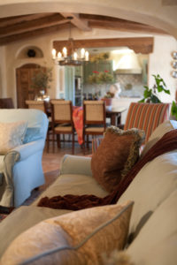 Robin's Egg Blue slipcovered sofa and chair in a Spanish Craftsman style home. Shiree Segerstrom Interior Design
