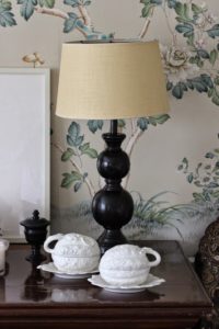 Simple blue and white wallpaper with bronze lamp, this scheme would be perfect for freshening up a spare room after the kids leave home.