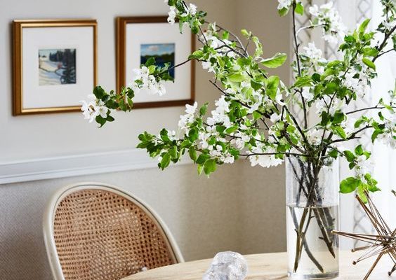 Sarah Richards design. Simple breakfast room with natural materials and oversize florals