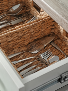 Use attractive, natural baskets for organizing inside of drawers and cabinets.