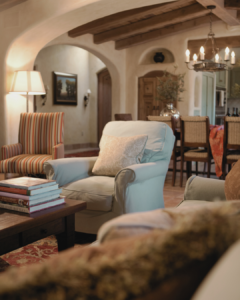 Slipcovers on sofas and armchairs are a great way to make the most of what you have in your home already. design by Shiree Segerstrom.