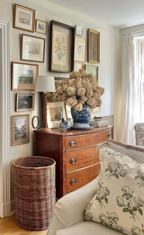 antique dresser with basket and art